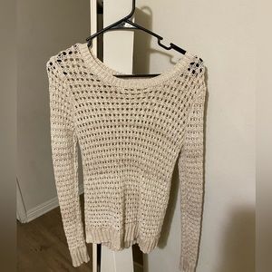 Knitted sweater cream color